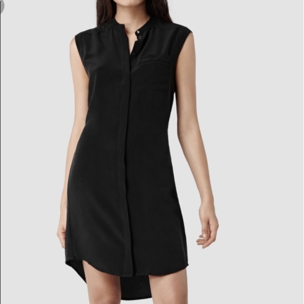 Black, sleeveless, button-down shirt dress. - Picture 1 of 4